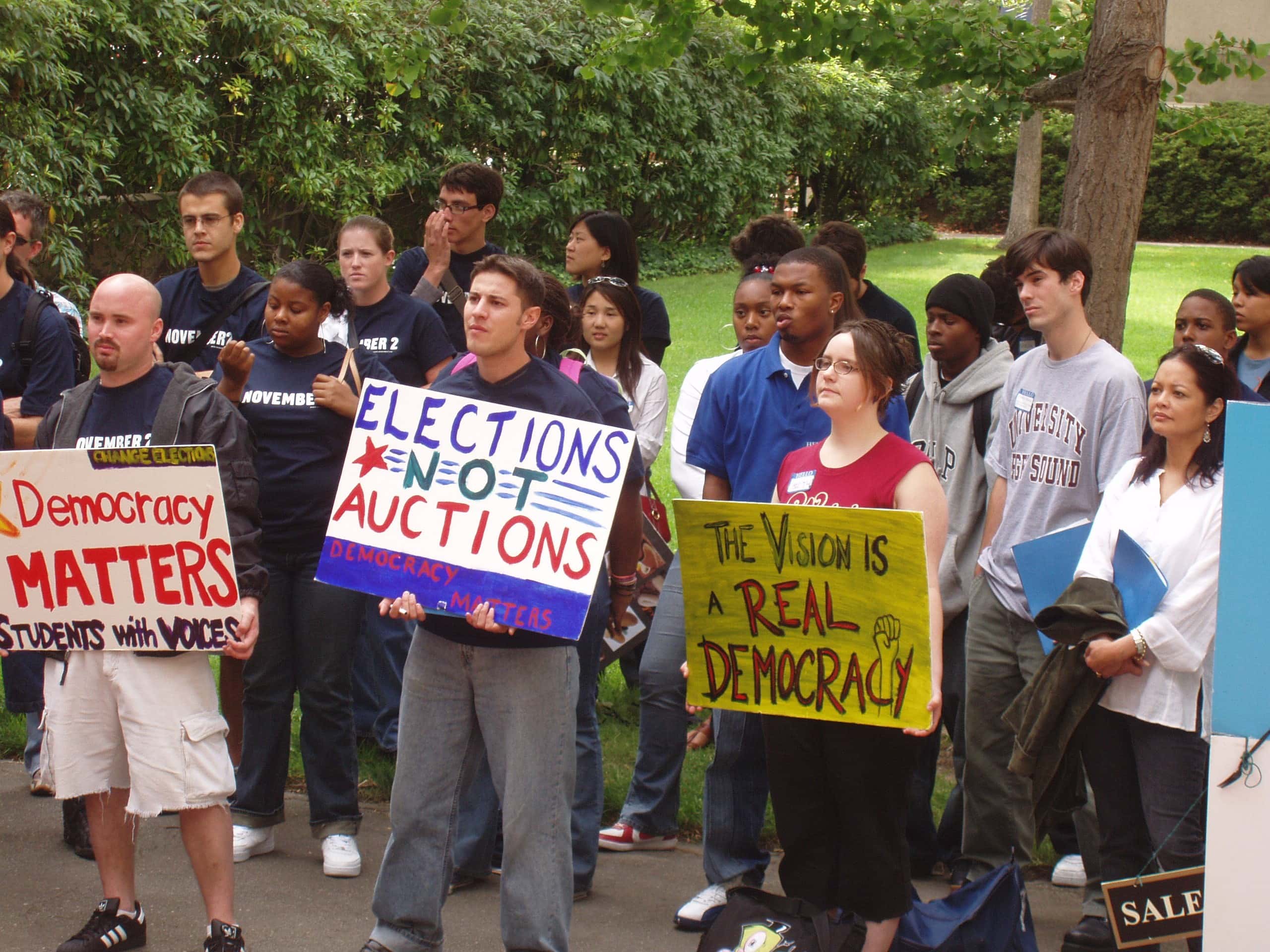Students Holding Signs 1