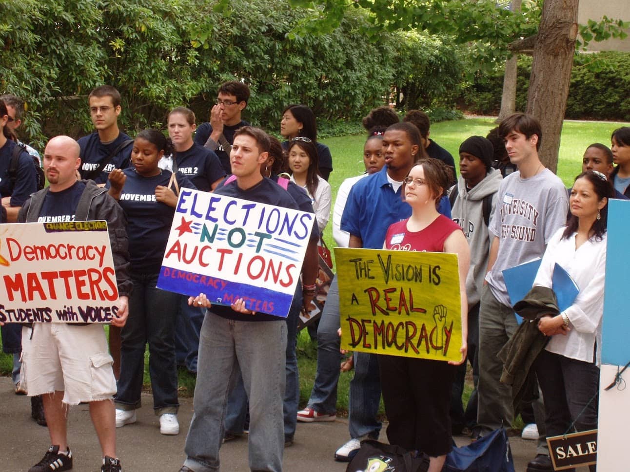 Students Holding Signs